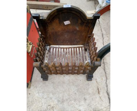 A VINTAGE CAST IRON FIRE GRATE 