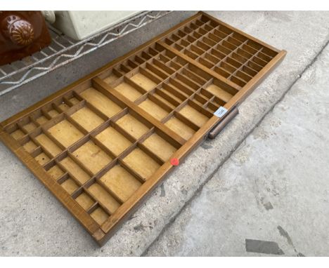 A VINTAGE BEECH PRINTER'S BLOCK DRAWER 