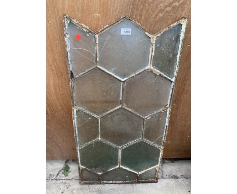 A VINTAGE METAL HONEYCOMB GLAZED WINDOW FRAME 