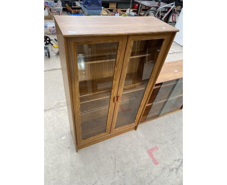 A MODERN TWO DOOR DISPLAY CABINET, 30" WIDE 