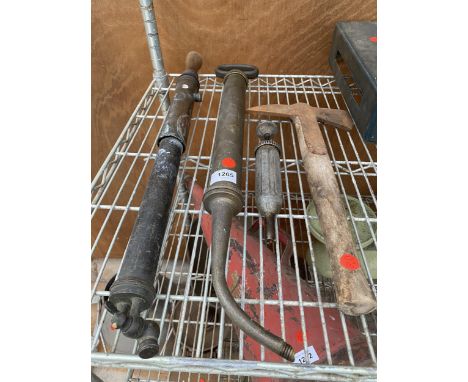 TWO VINTAGE GARDEN SPRAYERS, A GREASE GUN AND A PICK AXE 