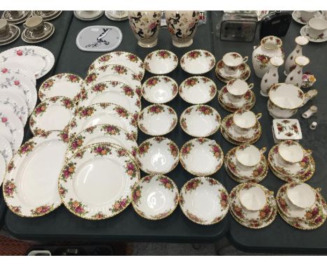 A LARGE QUANTITY OF ROYAL ALBERT 'OLD COUNTRY ROSES' TO INCLUDE DINNER PLATES, SERVING PLATE, BOWLS, CUPS, SAUCERS, SIDE PLAT