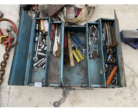 A METAL TOOL BOX CONTAING AN ASSORTMENT OF TOOLS TO INCLUDE SPANNERS, SOCKETS AND PLIERS ETC 