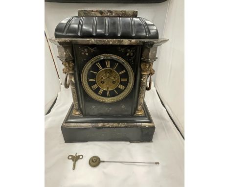 A HEAVY SLATE AND MARBLE MANTLE CLOCK WITH ENGRAVED FLOWER DECORATION AND LION HANDLES TO THE SIDE SIZE 46CM X 33CM - (MARBLE