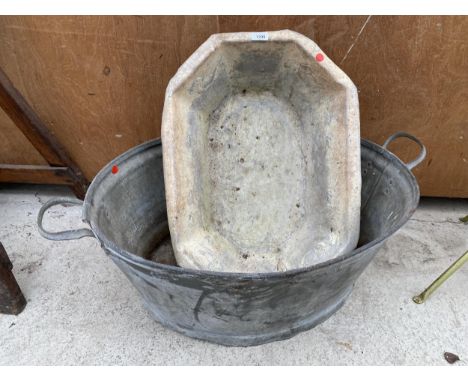 A TWIN HANDLED TIN BATH AND A FURTHER TIN TROUGH 