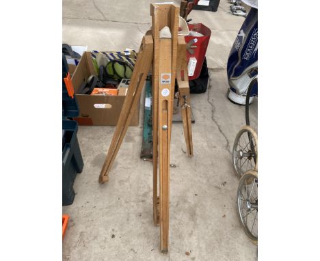 A VINTAGE WOODEN EASEL 