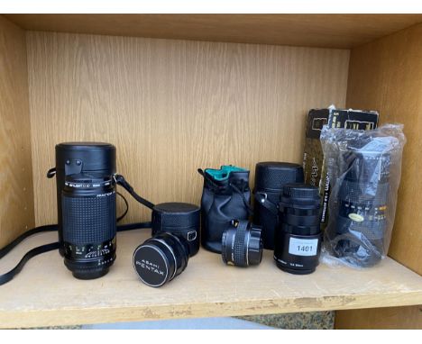 AN EXTENSIVE ASSORTMENT OF CAMERA LENS' TO INCLUDE A PRAKTICAR PM SKYLIGHT (1A), AN AUTO MITAKON ZOOM MC AND AN ASAHI PENTAX 