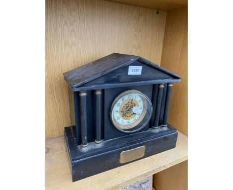 A HEAVY MARBLE MANTLE CLOCK WITH PLAQUE 'PRESENTED TO ELLIS LLYOD APRIL 1904' 