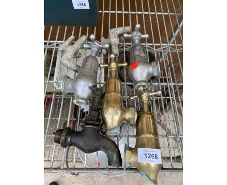 AN ASSORTMENT OF VINTAGE METAL TAPS 