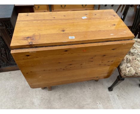 A MODERN PINE GATE LEG TABLE 