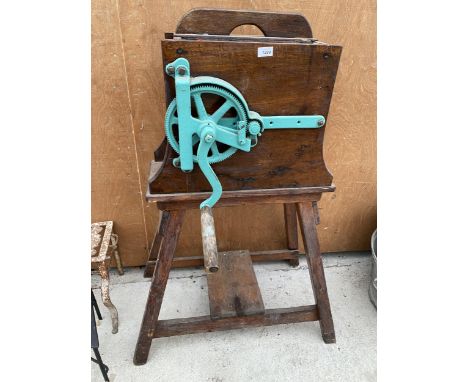 A VINTAGE WOODEN PULPER/JUICER WITH CAST IRON MECHANISM IN WORKING ORDER 