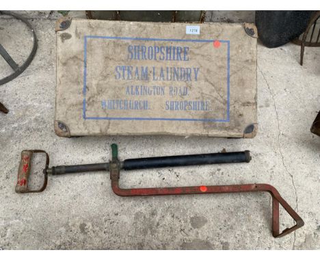 A VINTAGE PUMP AND A MONOGRAMED 'SHROPSHIRE STEAM LAUNDRY' BOX 