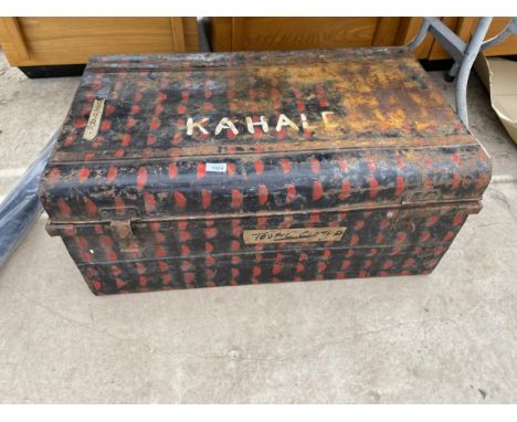 A LARGE VINTAGE METAL TRAVEL TRUNK 