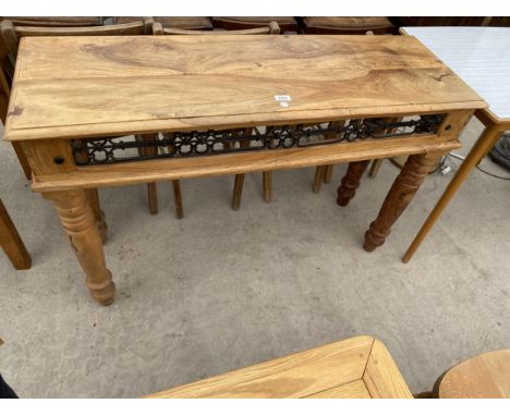 A MODERN HARDWOOD CONSOLE TABLE WITH METALWARE FRIEZE DECORATION ON TURNED LEGS 47" WIDE 