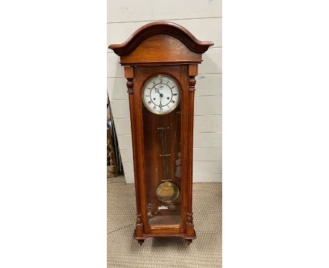 An eight day wall clock