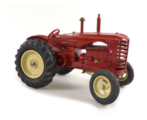 A 1950s Moko Lesney 'Massey-Harris 745D tractor', painted red and tan with rubber tyres, in original box, 20 by 11 by 13.5cm.
