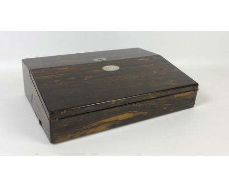 A Victorian coromandel and mother of pearl inlaid writing slope, with inset blue velvet and a pair of inkwells, various writi