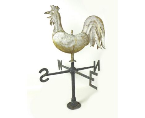 An early 20th century painted galvanized metal weather vane, surmounted with the figure of a cockerel, 68cm high.