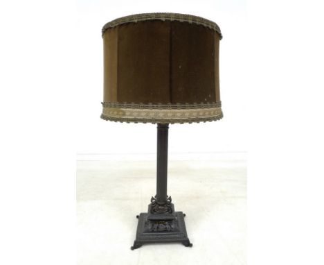 An early 20th century metal Corinthian column table lamp, with squared pierced and scrolled base on four feet, 24 by 78cm, wi