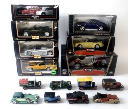 A collection of model cars, mostly 1/18 and 1/24 scales, including a Saico Chevrolet 3100 Pickup 1957, a Revell metal Mini Co