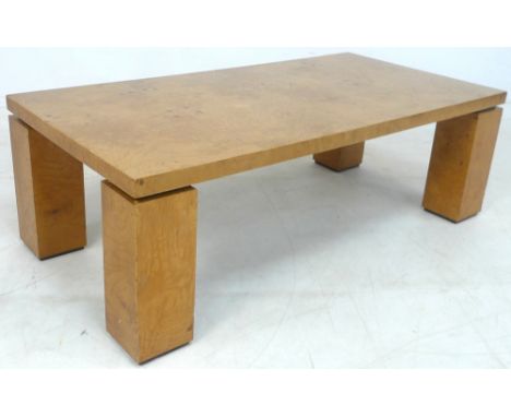 A Pieff cubist coffee table, circa 1970s, with rectangular light burred maple veneer, raised on oversized square section legs