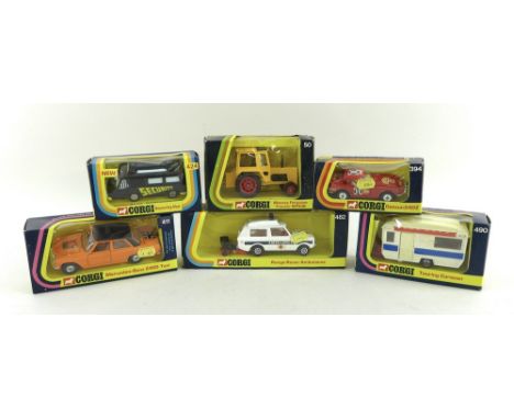 A group of six Corgi models comprising model no. 394, Datsun 240Z, model no. 490, Touring Caravan, model no. 411, Mercedes-Be