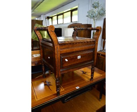 AN EDWARDIAN MAHOGANY PIANO STOOL