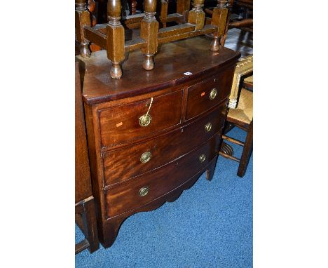A VICTORIAN MAHOGANY BOWFRONT CHEST, of two short and two long drawers, on bracket feet, approximate size width 89cm x height