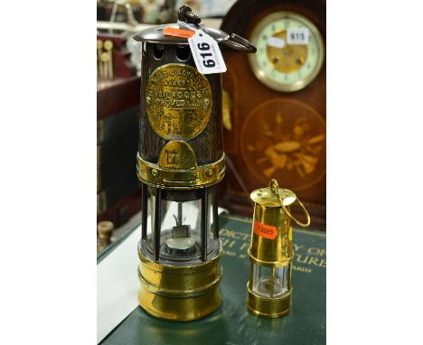 A HAILWOOD & ACKROYD LIMITED MINERS LAMP, together with a smaller example (2)