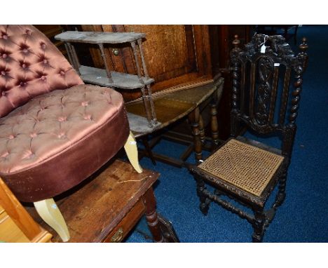 AN OAK DROP LEAF TABLE, carved oak cane seated hall chair, a pair of bedroom chairs, an oak hanging wall shelf and a mirror (