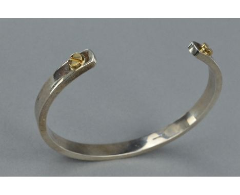 A SILVER BANGLE, approximate weight 33.8 grams