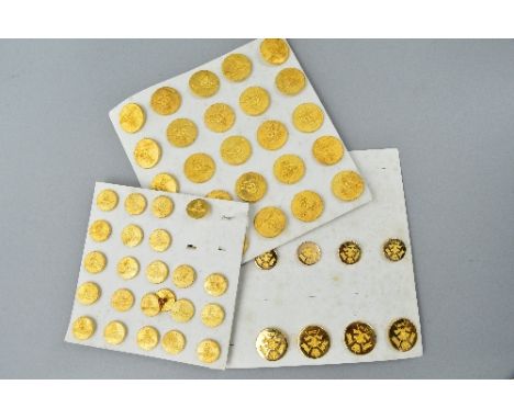 THREE CARD TRAYS CONTAINING A NUMBER OF GOLD COLOURED BRITISH ARMY UNIFORM BUTTONS, large and small, mostly Royal Artillery, 