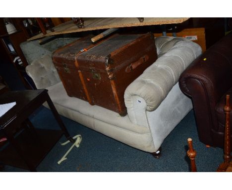 A HEAVY VICTORIAN UPHOLSTERED CHESTERFIELD SOFA