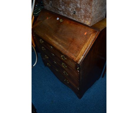 A GEORGIAN WALNUT FALL FRONT BUREAU, with fitted interior, comprising of six various drawers with inlaid border and ivory han