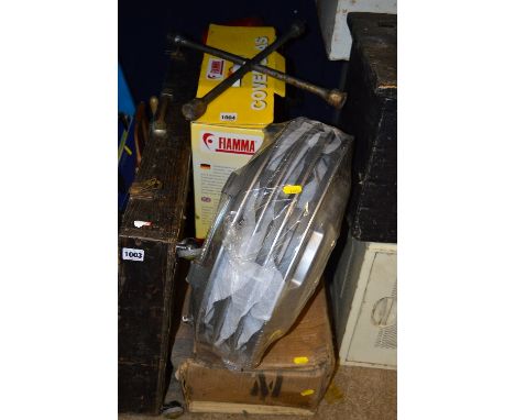 A TROLLEY JACK, in box, bottle jack in box, a set of wheel trims, wheel brace and a Fiato Ducato windscreen cover (5)