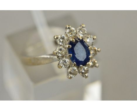 AN 18CT SAPPHIRE AND DIAMOND RING, ring size K, approximate weight 4.1 grams