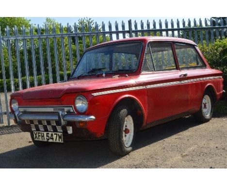 A 1974 HILLMAN IMPRO SUPER IN RED, REG NO XFH 547M, mileage shown 63042, 900cc petrol engine, manual gearbox, V5C present no 