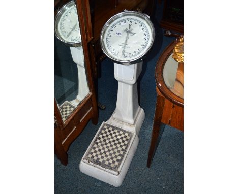 A WHITE ENAMEL STANDING SCALES, with circular dial, marked Vandome & Hart Ltd, London, The Feltway