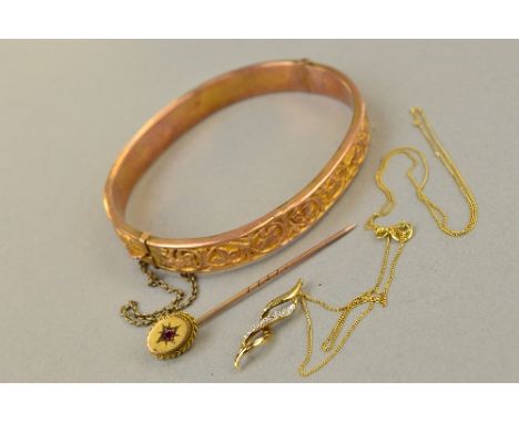 A 9CT BANGLE AND A 9CT TIE PIN AND 9CT PENDANT, approximate weight 10.1 grams