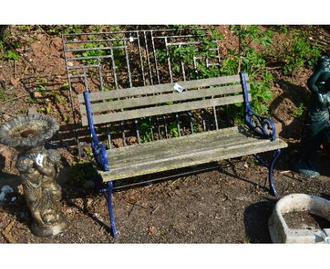 A GARDEN BENCH WITH PAINTED CAST METAL ENDS AND STRETCHER, together with a garden gate, gate approximately 120cm x 102cm and 