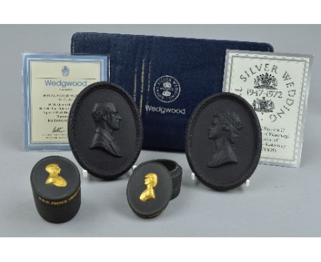 A BOXED PAIR OF LIMITED EDITION WEDGWOOD BLACK BASALT MEDALLIONS, commemorating Royal Silver Wedding 1947-1972, HM Queen Eliz