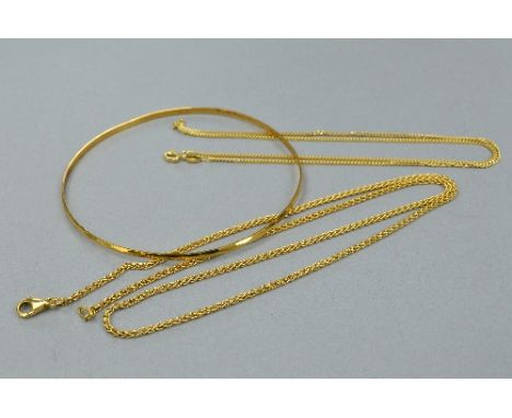 TWO 18CT NECKLACES, and an 18ct bangle, approximate lengths 45cm and 41cm, approximate weight 14 grams