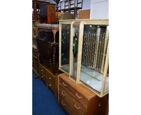 AN OAK BARLEY TWIST DROP LEAF TABLE, a G Plan oak chest of three drawers, four stacking stools, a long footstool, a wall hang