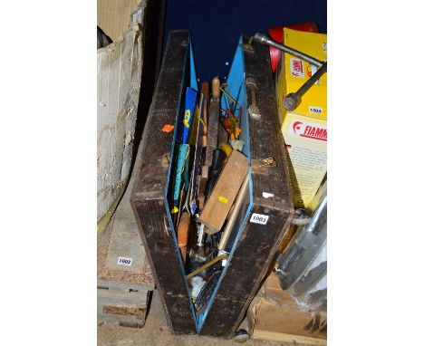 A WOODEN CARPENTERS TOOLBOX, including Spear and Jackson saws, hammer, mallets, etc