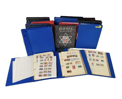 World stamps, including Israel, Hungary, New Zealand, Philippines, Cuba, Romania, Iraq etc, housed in eighteen ring binder fo