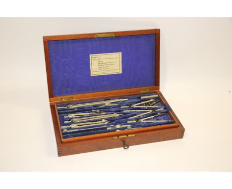 CASED GEOMETRY SET - HUDSON & KEARNS a mahogany cased Geometry Set, the top layer with a variety of dividers and other items,