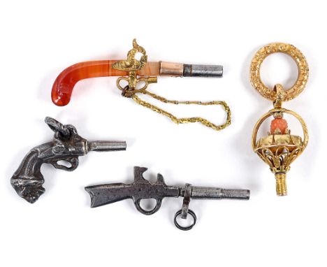 ANTIQUE WATCH KEYS - PISTOLS 4 watch keys including an agate handled key in the form of a Pistol, a steel key in the form of 