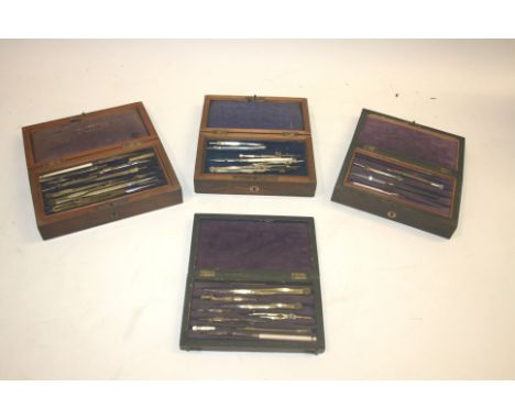 FOUR CASED GEOMETRY SETS 4 Rosewood cased antique geometry sets, including one set by Compas Superieurs with two layers, one 