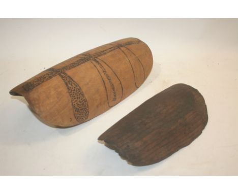 ABORIGINAL BOWLS - TRIBAL two wooden gathering bowls, one with incised decoration. Largest 47cms long