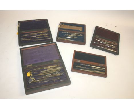 CASED GEOMETRY SETS 5 antique cased geometry sets, including a small cased set (bone handle marked J H Steward, cased set wit